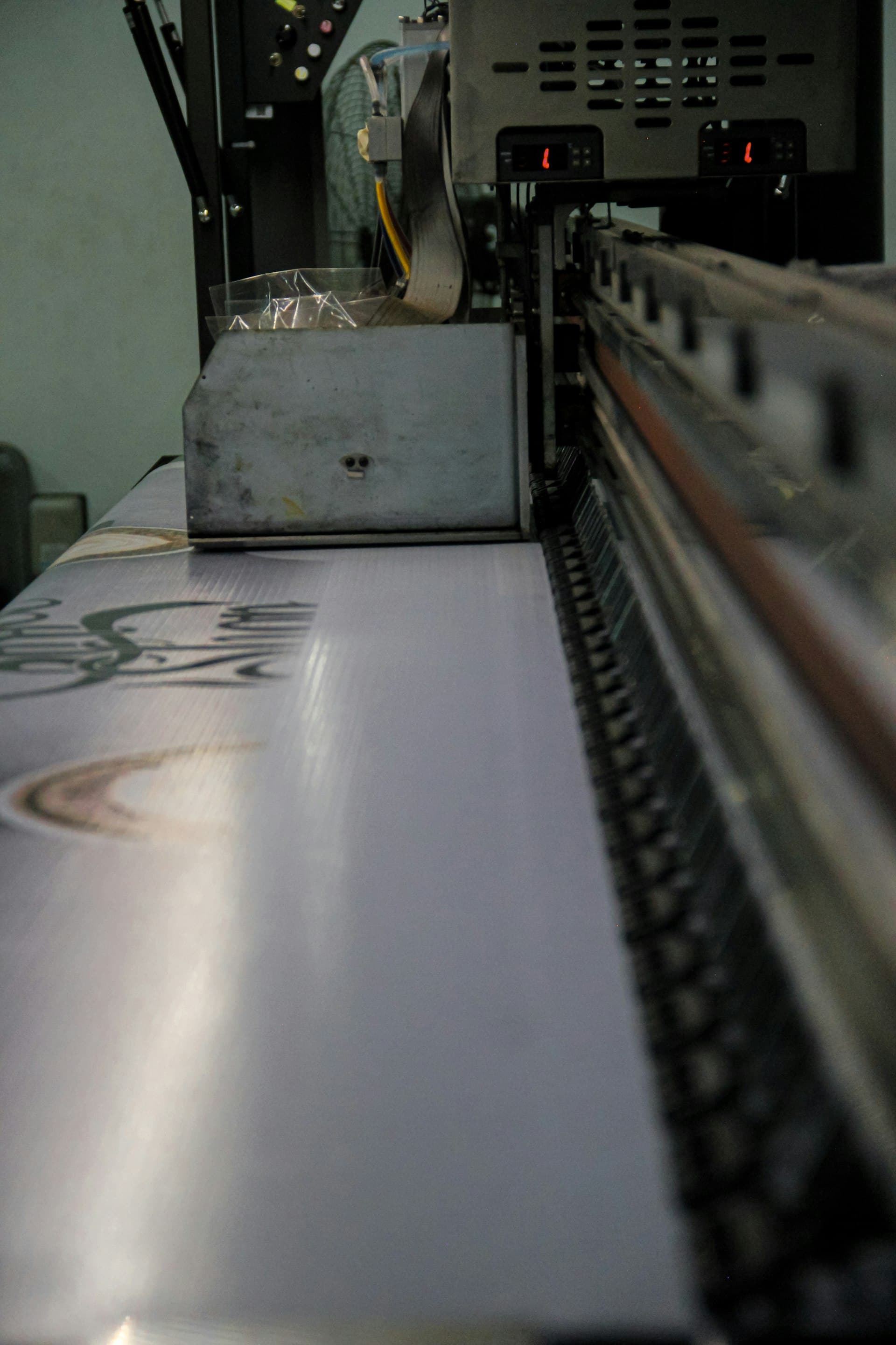Close-up detail of Kento Hybrid printing line showing digital inkjet and flexo stations